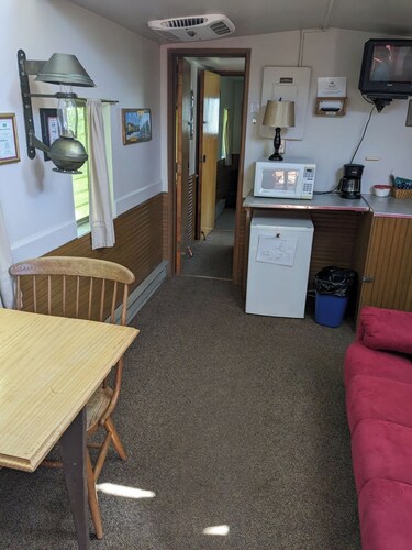 Train caboose with open floor plan, high ceilings & modern airy feel