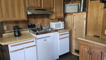 Microwave, coffee/tea maker, cookware/dishes/utensils