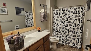 Bathroom - Elevated luxury awaits at Legacy Cabins, where bison roam just beyond. (Hanna City)