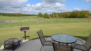 Outdoor dining - Elevated luxury awaits at Legacy Cabins, where bison roam just beyond. (Hanna City)