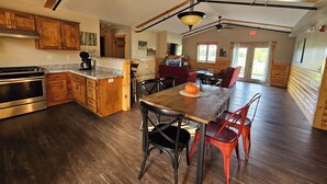 Dining - Elevated luxury awaits at Legacy Cabins, where bison roam just beyond. (Hanna City)