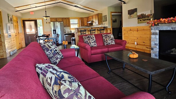 Living area - Elevated luxury awaits at Legacy Cabins, where bison roam just beyond. (Hanna City)