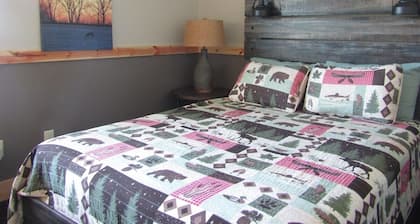 Elevated luxury awaits at Legacy Cabins, where bison roam just beyond.