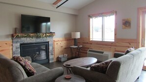 Living area - Elevated luxury awaits at Legacy Cabins, where bison roam just beyond. (Hanna City)