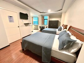 Egyptian cotton sheets, premium bedding, down comforters, minibar