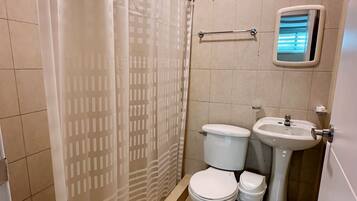 Shower, hair dryer, towels, soap