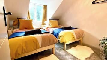 2 slaapkamers, een strijkplank/strijkijzer, beddengoed