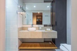 Business Studio (508540) | Bathroom | Shower, rainfall showerhead, hair dryer, towels
