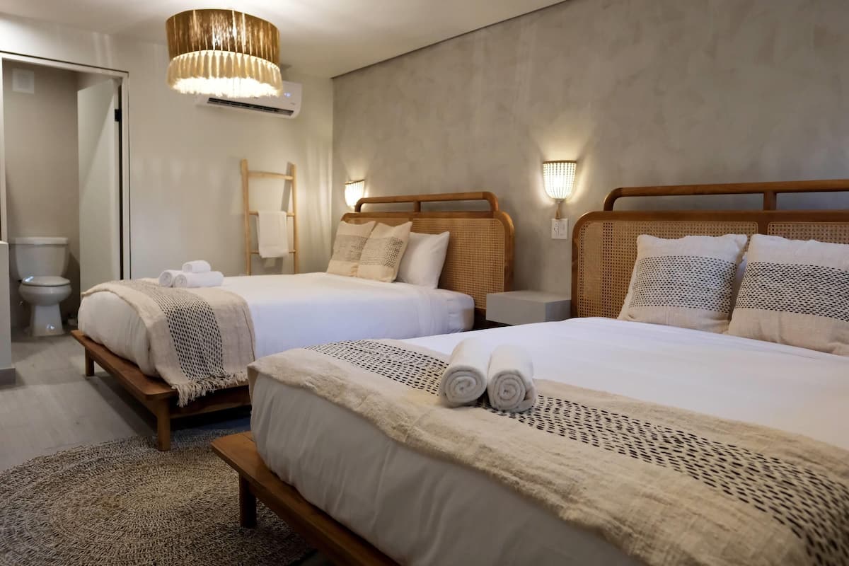 Standard Room, 2 Queen Beds, Non Smoking | 1 bedroom, free WiFi, bed sheets