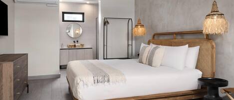 A modern bedroom with a wooden bed, a bedside table, a hanging light fixture, and a built-in air conditioning unit.