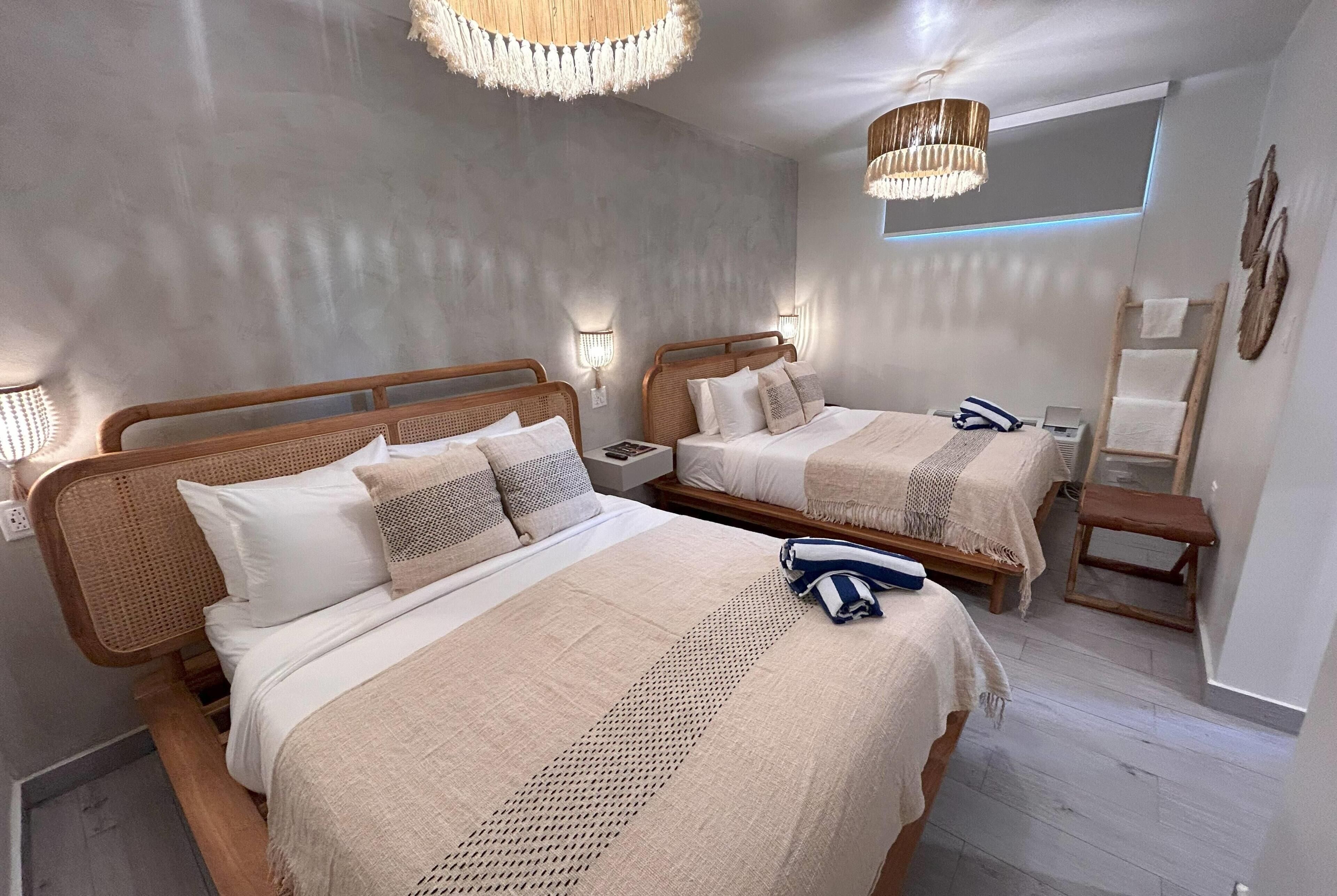 スーペリア スイート ベッド (複数台) 禁煙 | ミニバー、セーフティボックス (室内)、客室ごとに異なる装飾、客室ごとに異なるインテリア