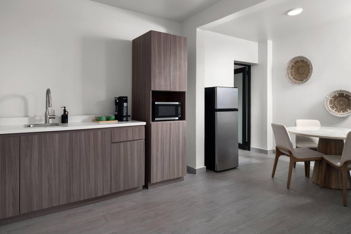 Superior Suite, Multiple Beds, Non Smoking | Minibar, in-room safe, WiFi (free), individually decorated
