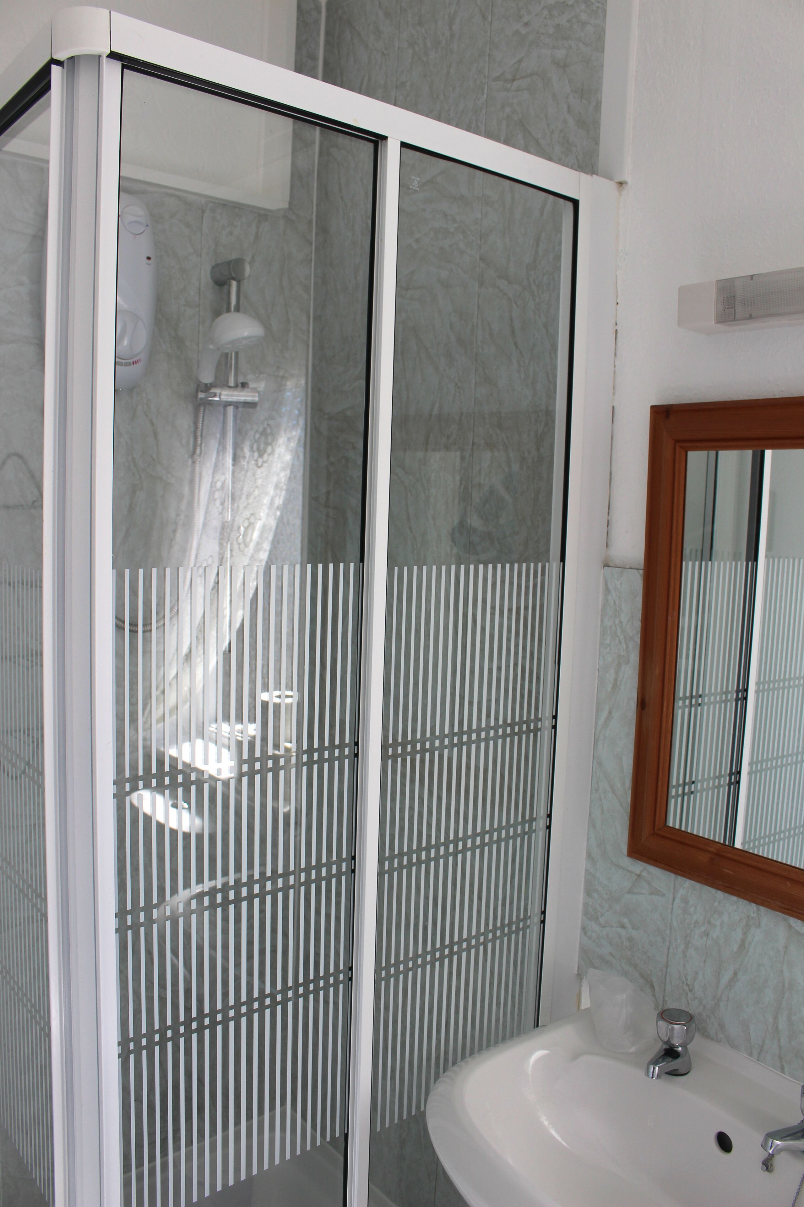 Badkamer met douche