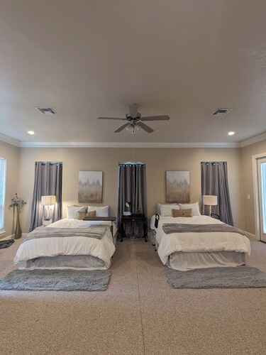 Charming Country Cottage nestled among majestic oaks on 5-acre private retreat.