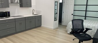 New Private Studio with Bed, attached bathroom and kitchen with SS appliances.