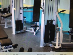 Stay fit and active in our well-equipped gym with weight machines and benches.