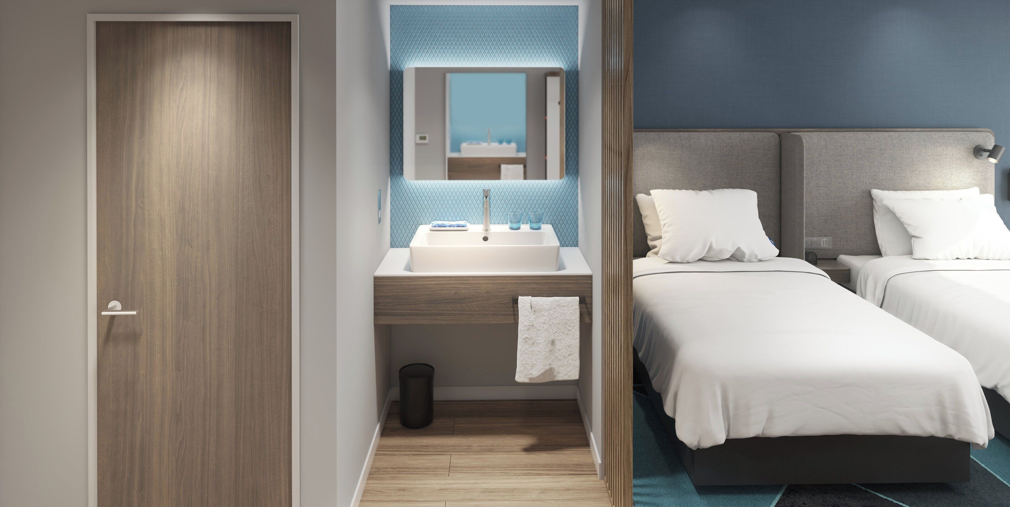 Ein modernes Hotelzimmer mit einer Holztür, einem Badezimmer mit Waschbecken und Spiegel sowie zwei Betten mit weißer Bettwäsche.