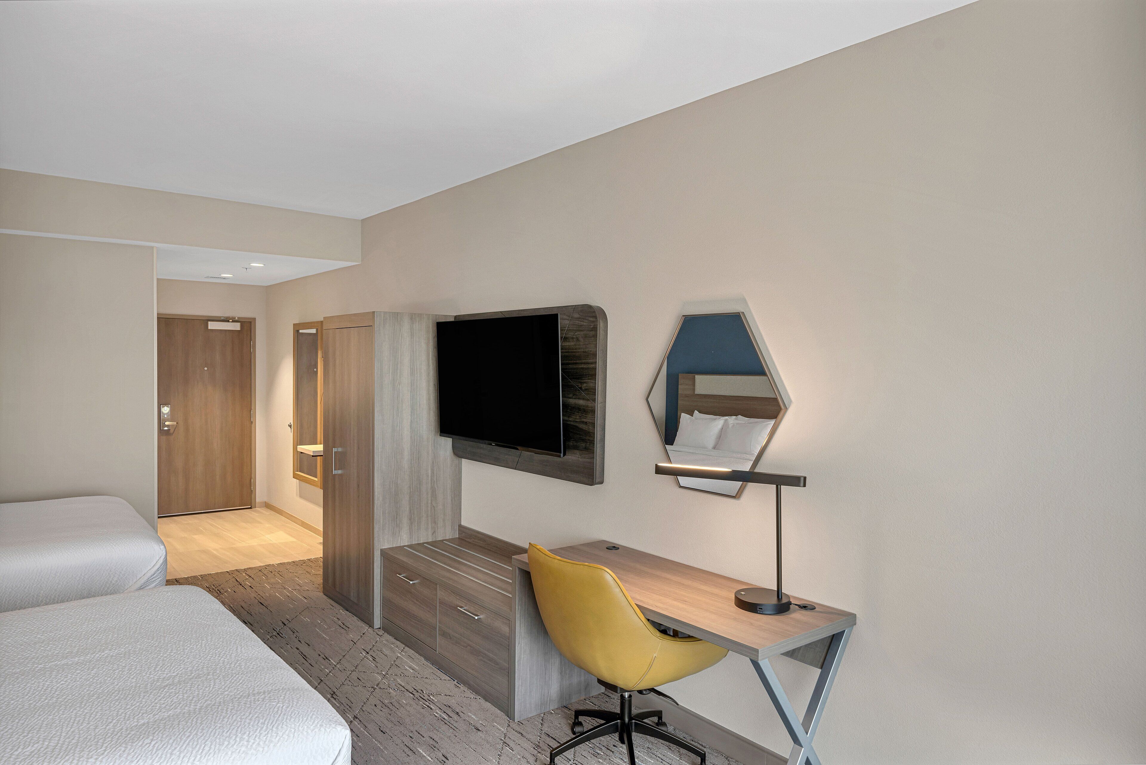 Suite, 2 Queen Beds | Desk, laptop workspace, free cribs/infant beds, free WiFi