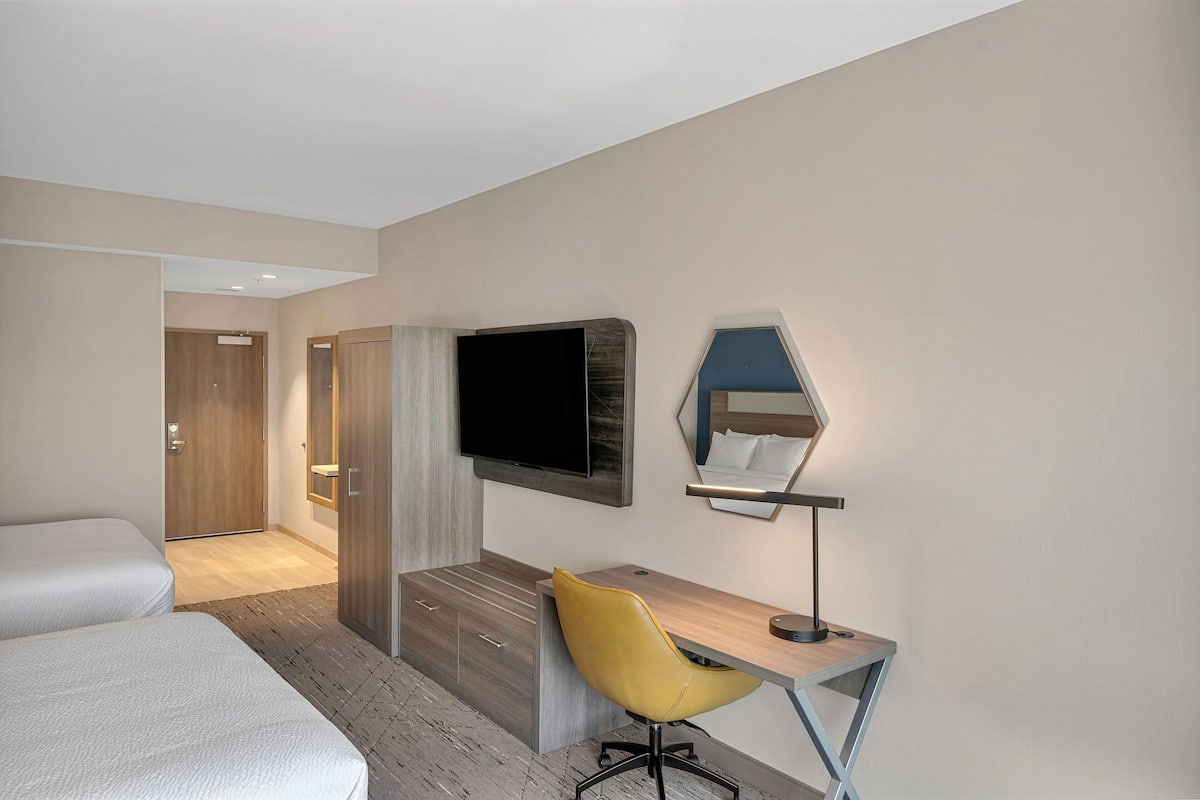 Suite, 2 Queen Beds | Desk, laptop workspace, free cribs/infant beds, free WiFi