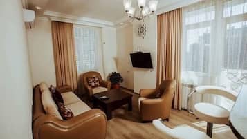 City Apartment | Living area | Flat-screen TV