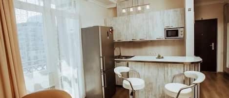 City Apartment | Living area | Flat-screen TV