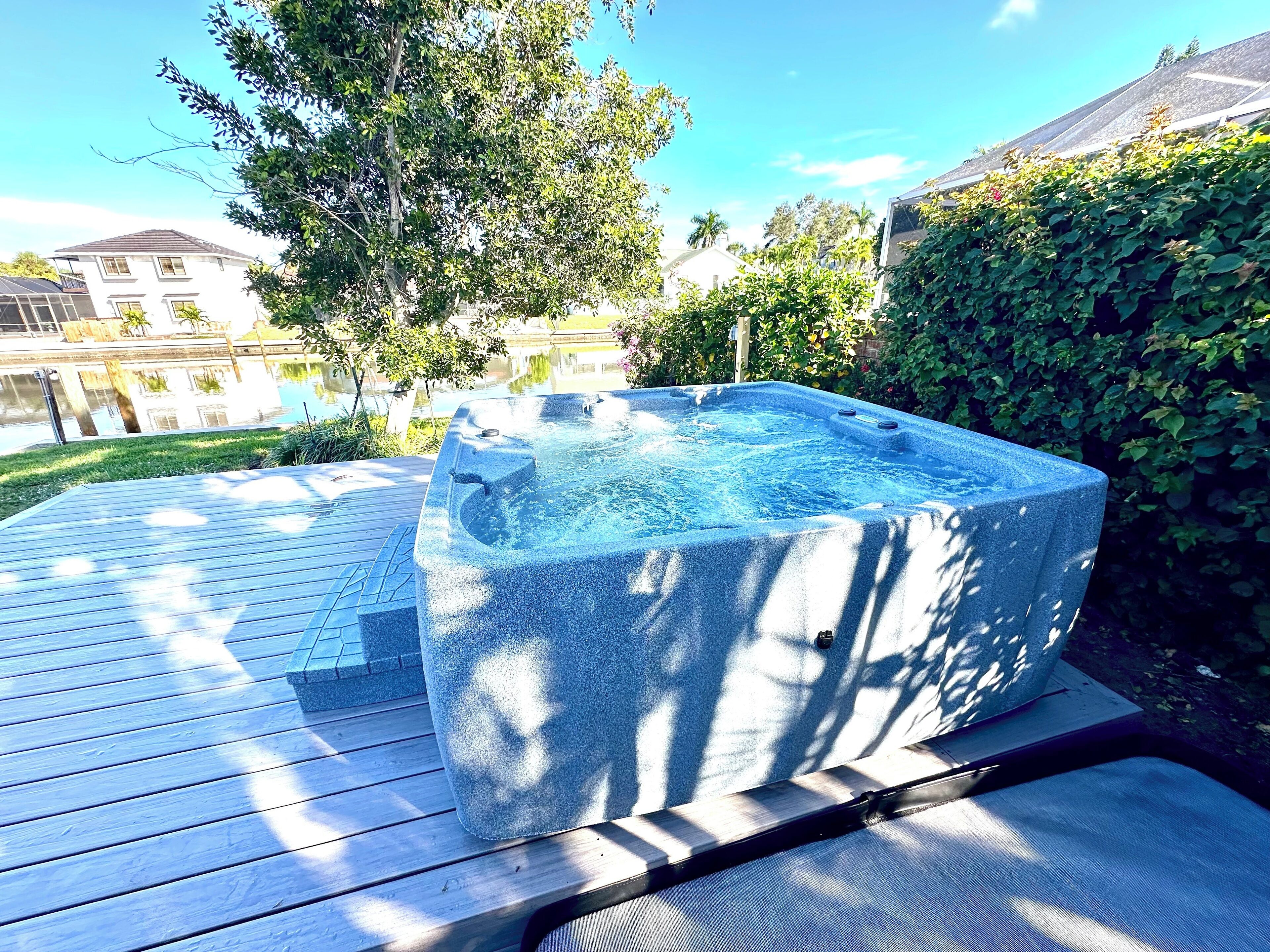 On the water! Canal Home with Private Spa! 3 Bedroom 3 Bathroom