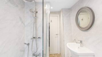 Shower, hair dryer, shampoo
