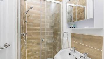 Shower, hair dryer, shampoo