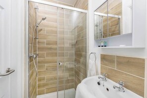 Shower, hair dryer, shampoo