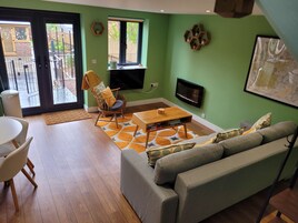 Cabin | Living area | TV, fireplace