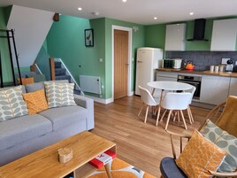 Cabin | Living area | TV, fireplace