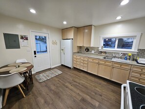 Microwave, oven, stovetop, paper towels - Charming & Updated "4 Square" Home in Guernsey, Centrally Located! W/2br, 1ba (Guernsey)