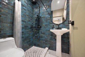 Shower, hair dryer, towels, soap