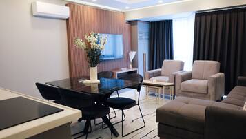 Family Suite, City View | Living area | LCD TV