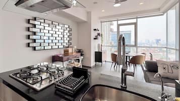 City Apartment, City View | Private kitchen | Full-sized fridge, microwave, oven, espresso maker