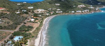 Beach Villa: Watch the Sunrise over the Caribbean Sea
Walk right onto the Beach