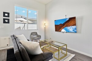 Comfort House, Patio | Living area | Flat-screen TV