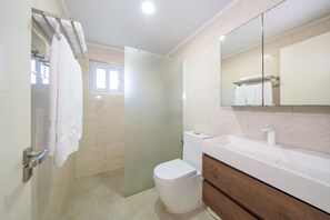 Shower, towels, soap, shampoo