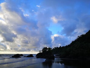 On the beach, black sand, beach bar