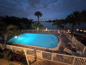 Outdoor pool, a heated pool - Waterfront 2-bedroom condo on Treasure Island, only 250 feet to the beach. (Treasure Island)