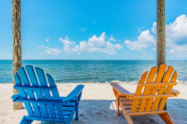 On the beach, sun loungers, beach towels