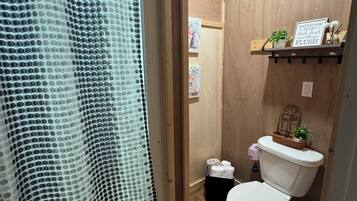 Shower, towels, soap, shampoo