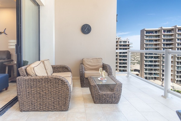 The balcony sliding door opens double to reveal...paradise!