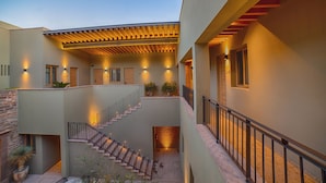A modern building with a covered outdoor area, multiple staircases, and outdoor lighting. - Hotel Casa Aranzazu San Luis Potosi (San Luis Potosi)