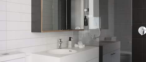 Shower, hair dryer, towels, soap