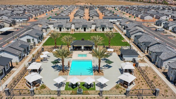 A residential area with modern houses arranged in rows, a central swimming pool, and outdoor seating areas. - Luminous Sunrise Home with Pool and BBQ (Casa Grande)
