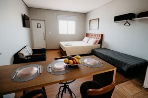 Family Double Room, Courtyard View | Private kitchen | Microwave, stovetop, espresso maker, griddle