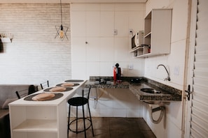 Exclusive Studio, Courtyard View | Private kitchen | Microwave, stovetop, espresso maker, griddle