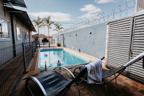 Outdoor pool, open 9:00 AM to 10:00 PM, sun loungers