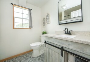 Shower, towels, toilet paper